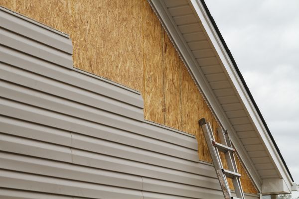 Grey Vinyl Siding Installation in Elk River